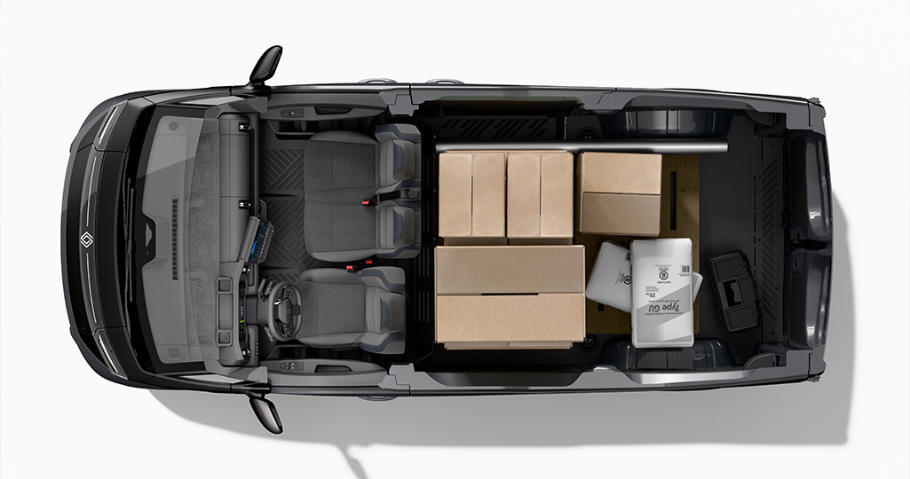 Bilden visar en Renault Trafic E-Tech electric ovanifrån om den inte hade ett tak så man ser stolar och lastutrymme